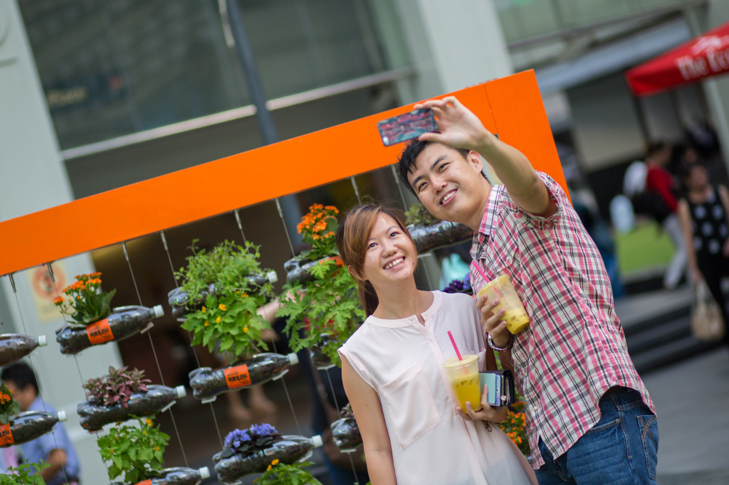 A couple takes a selfie at the gardening display. (Credit: RUN350).