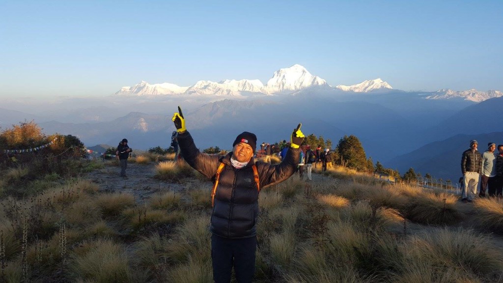 Tan soaks up the beautiful scenery in Nepal. [Photo by Louis Cheongkf/Facebook]