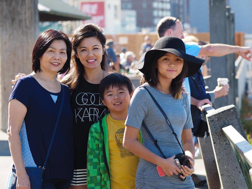 From left to right - Jenny's mom Sue Huang, Jenny Huang, and her children - Austin, 12 and Zoe, 15.