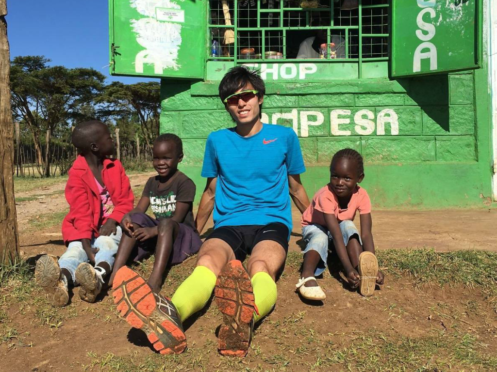 Soh and his young "cheerleaders."