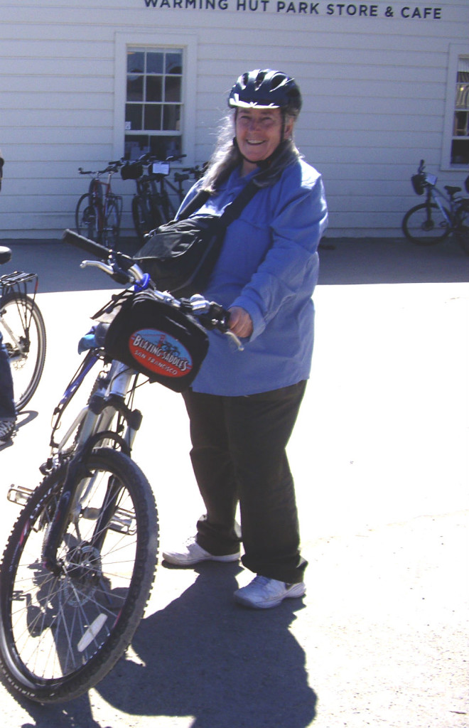 Liz Stewart, two months before her cancer diagnosis - on a bike ride over the Golden Gate Bridge.