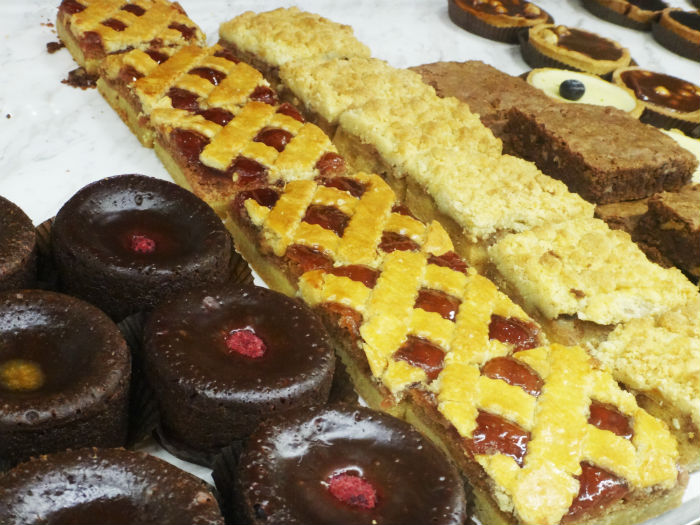 A scrumptious range of desserts greets customers.