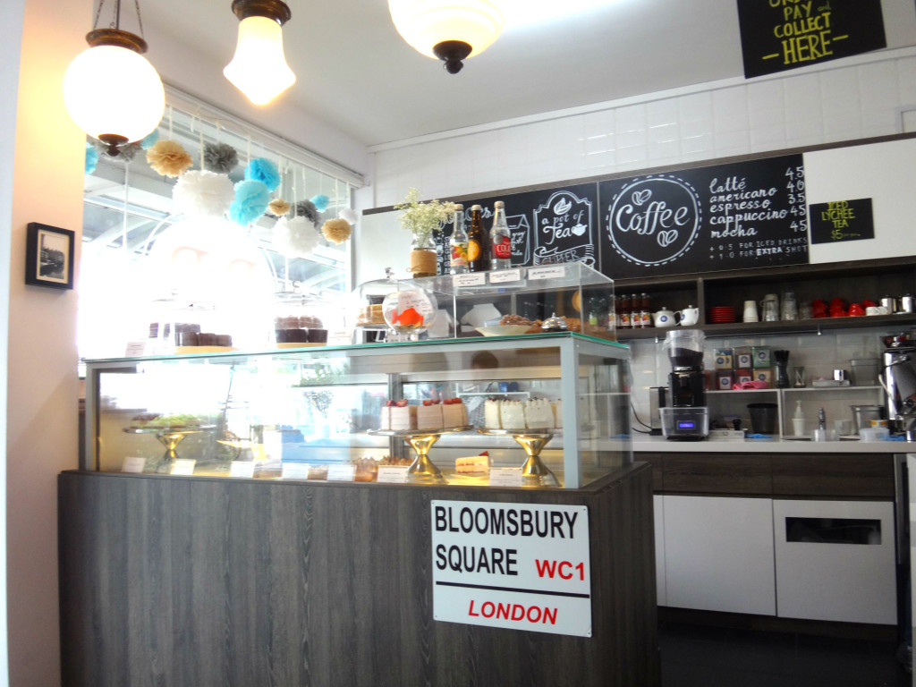 A glass cabinet full of cakes greets you at Bloomsbury Bakers.