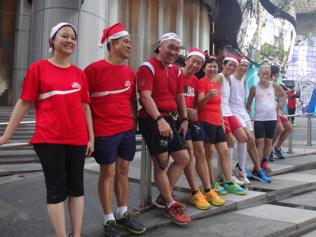 Runners taking a well-earned rest after their run - at ION Orchard Mall.