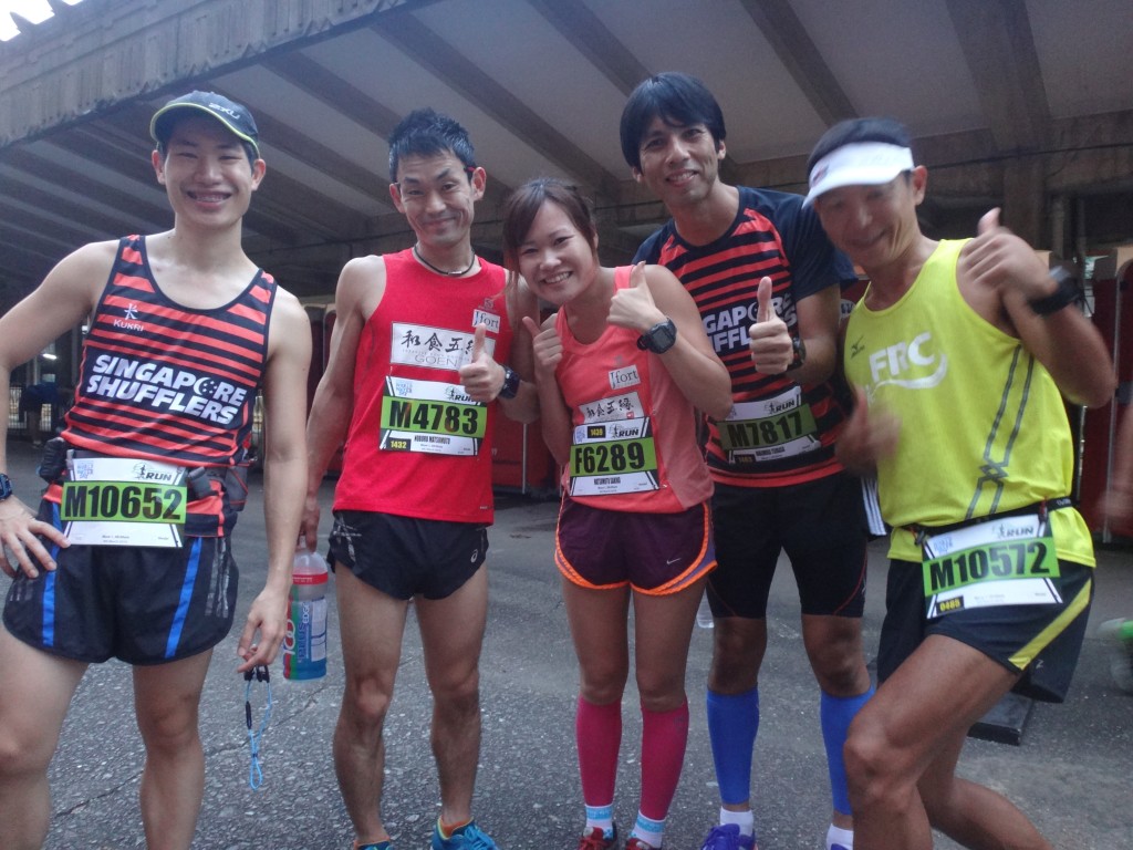 Runners pose for a photo before the race begins.