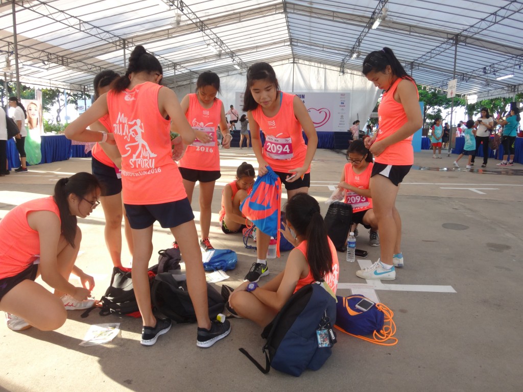 Runners get themselves ready for the race.