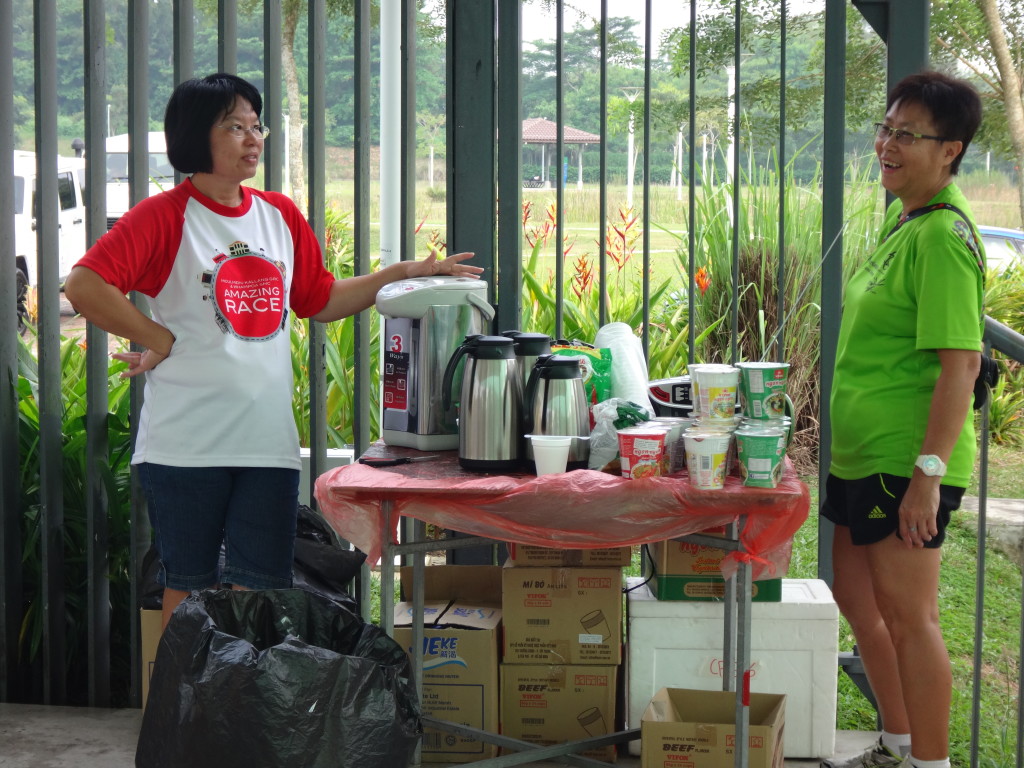 Volunteers manning the instant noodle and hot drink station.
