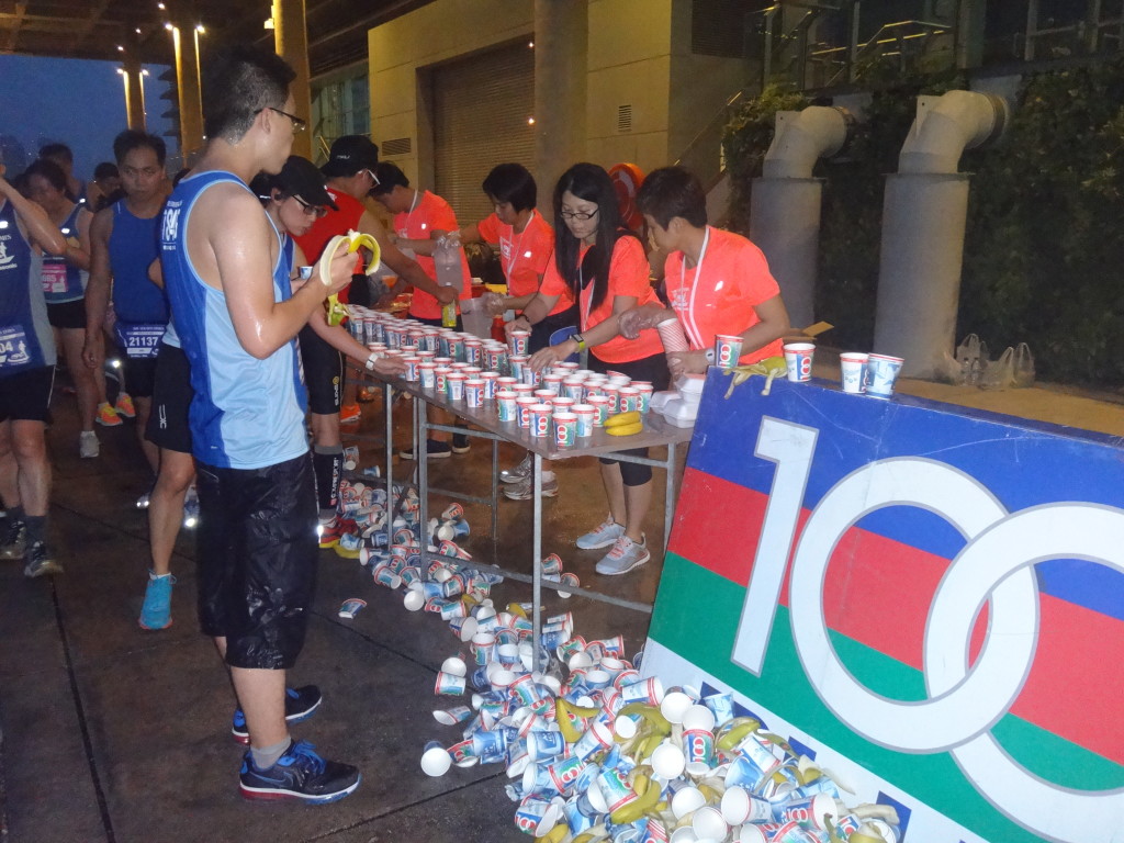 Runners hydrate themselves during the run.