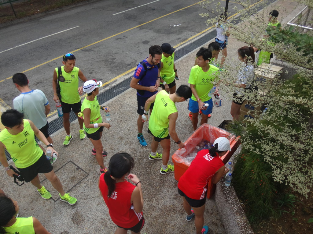 Runners and pacers help themselves to drinks after the session.