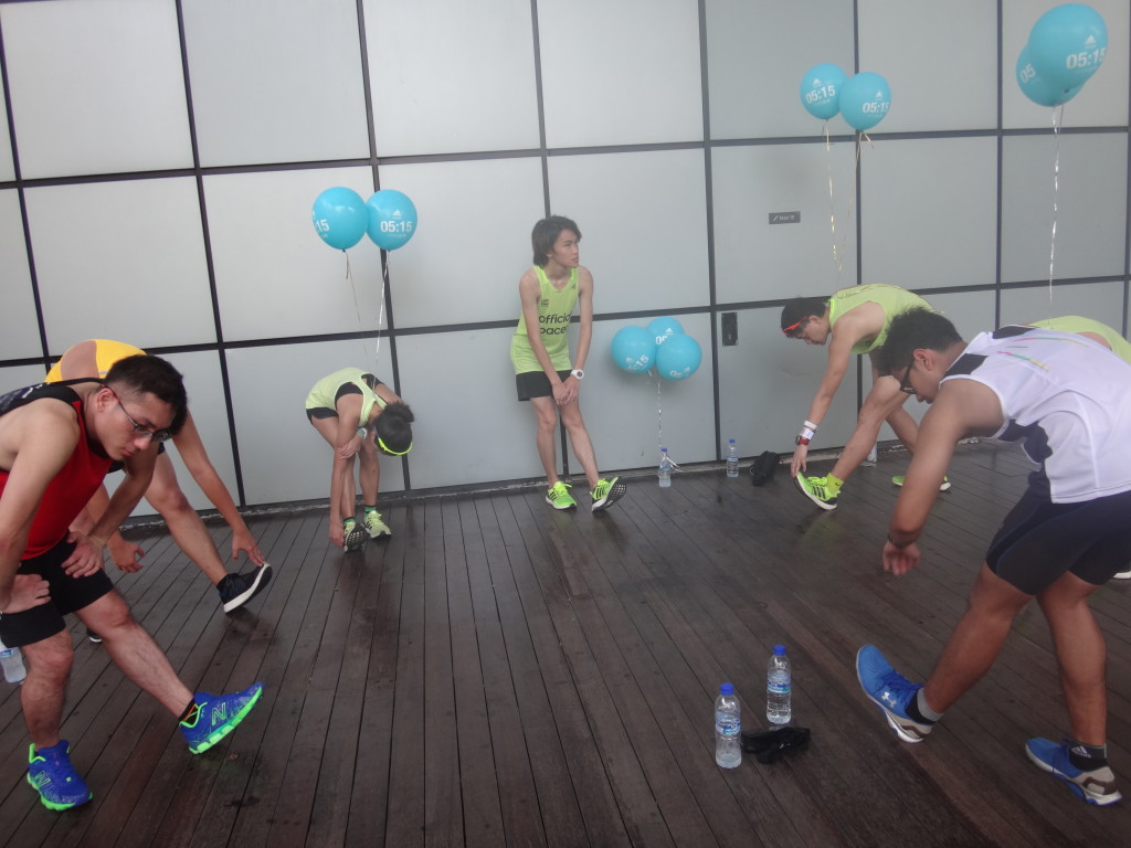 Stretching to cool down post-run.