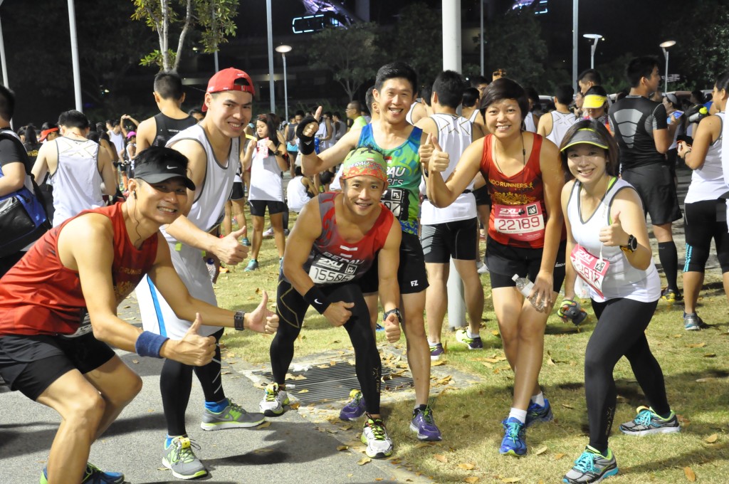 Happy runners are all smiles before the race begins.
