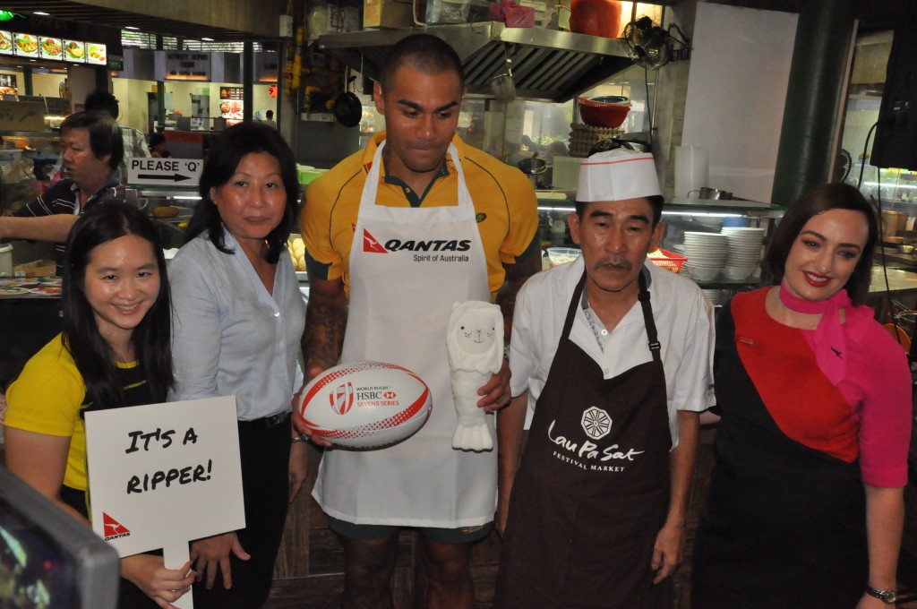 Judges pose with the competition winner.