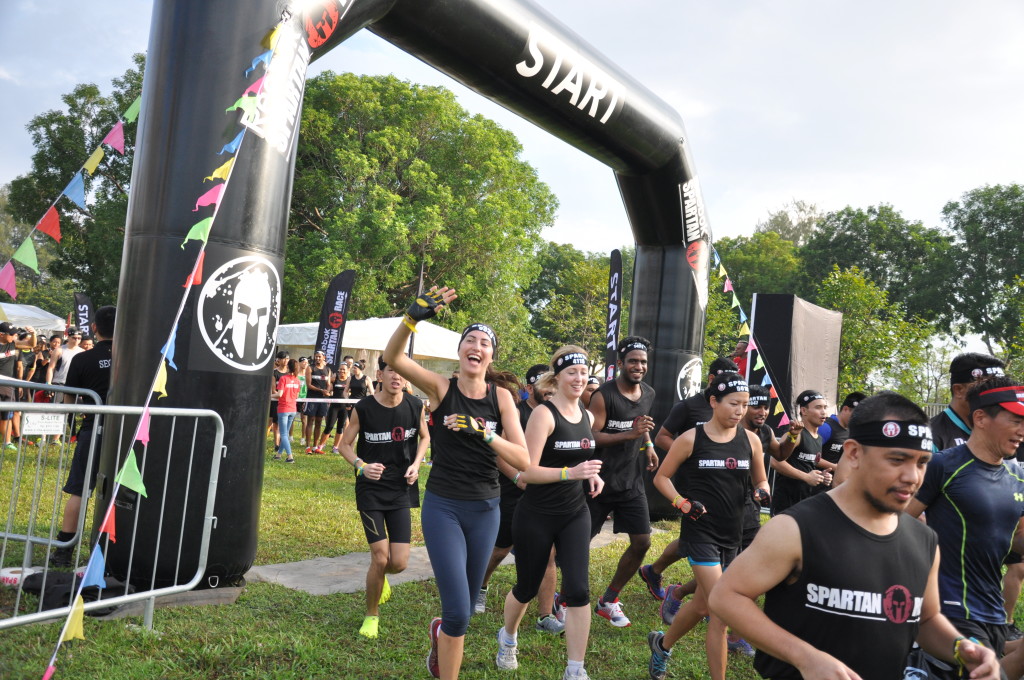 Participants cross the start line to begin their Spartan journey.