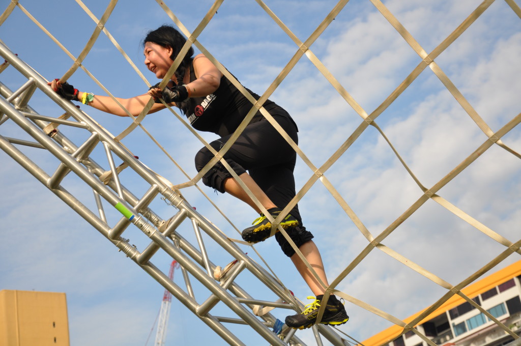 Trying to keep her balance on the net.