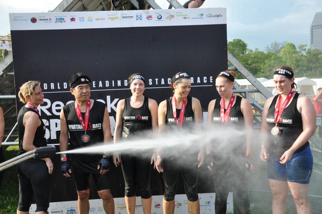 Victorious participants getting hosed down.