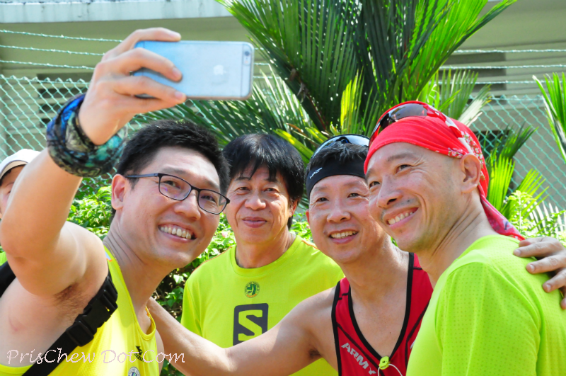 Runners take a selfie.