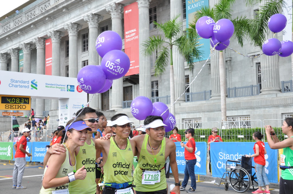 Colourful pacers pose for a group photo.