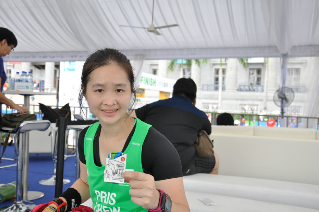 Recharging in the VIP tent with my finisher's medal.