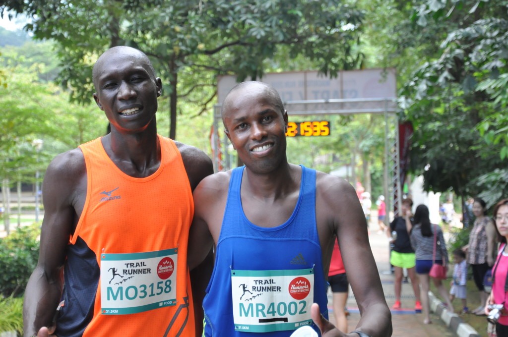 Runners smile for the camera.