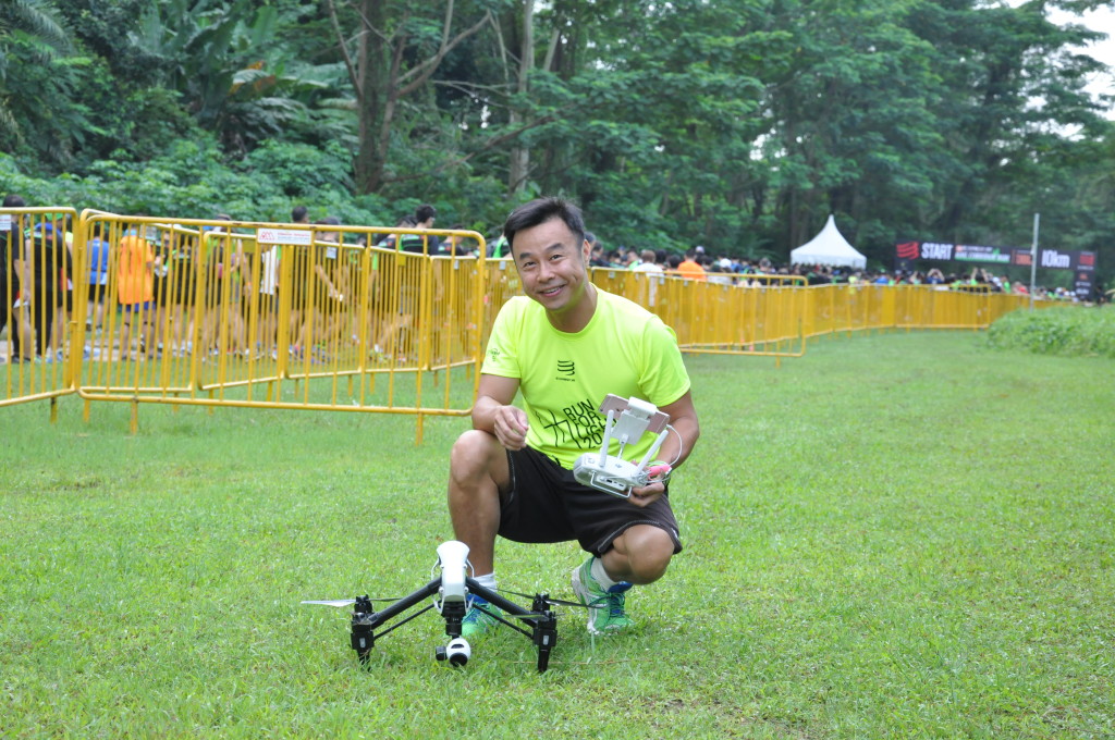 The pilot prepares the remote-controlled drone before it lifts off into the air.