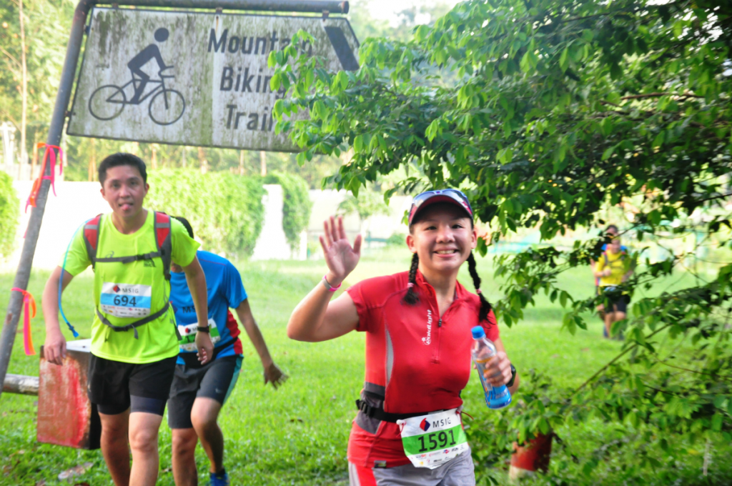 Runners smile for the camera.