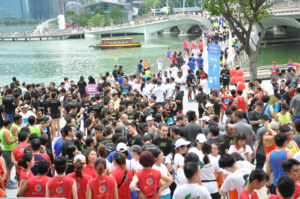 Runners line the Esplanade Bridge before the start of the J.P. Morgan Corporate Run.