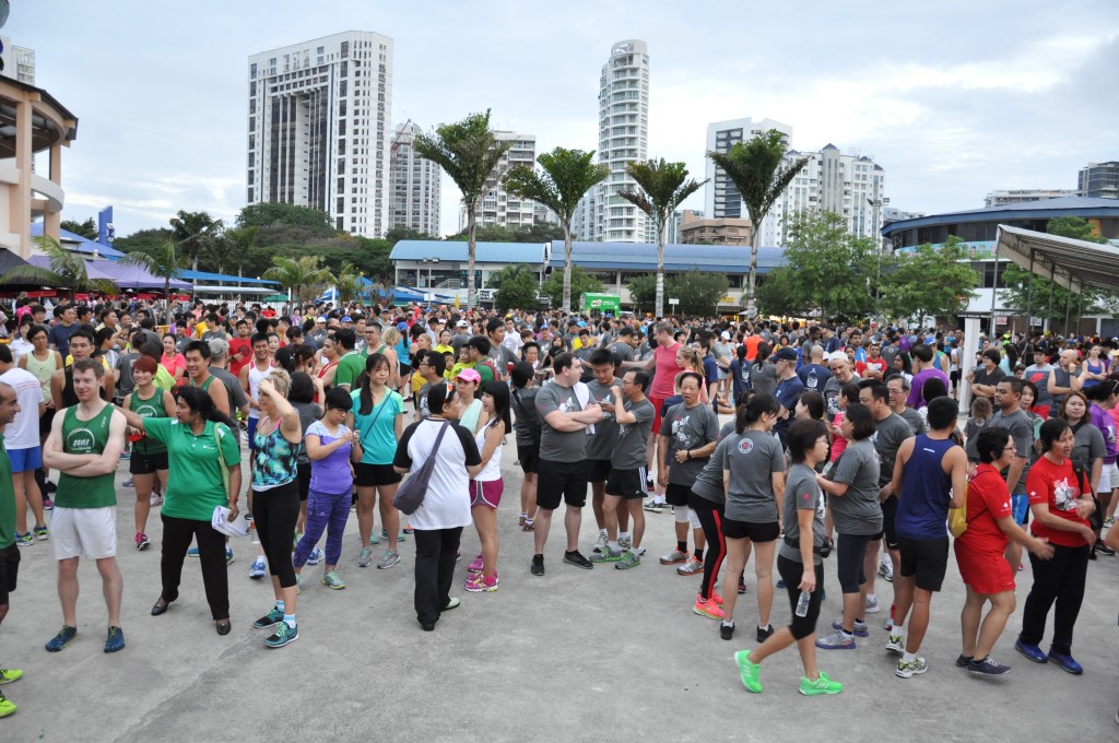 Runners mingle around at the start line before the run.