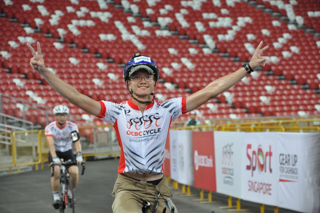 A happy cyclist upon completion of his ride