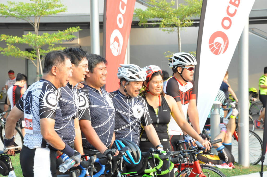 Cyclists pose for the camera.