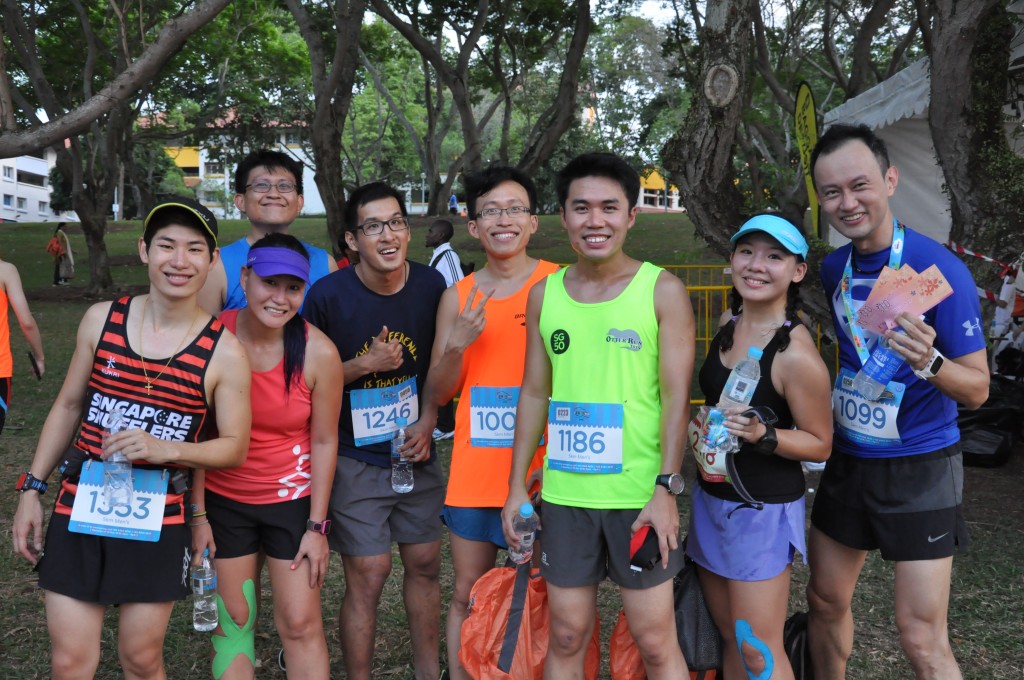 Happy runners smiling after the race.