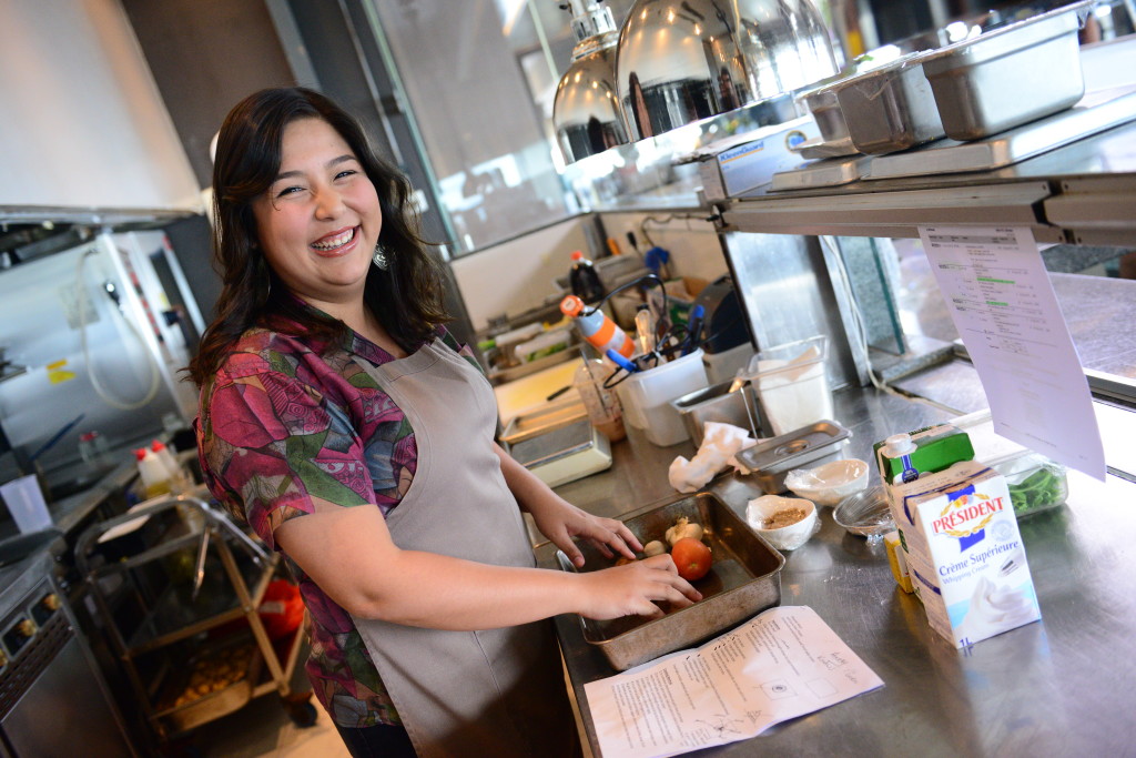 Ili takes a break from cooking to pose for the camera. (Credit to: Scripps Networks Interactive).