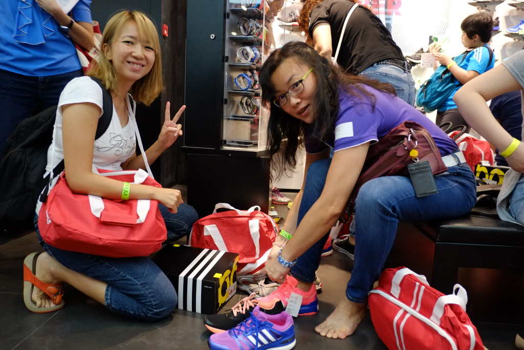 Participants trying on their adidas shoes. Credit: GEWR.