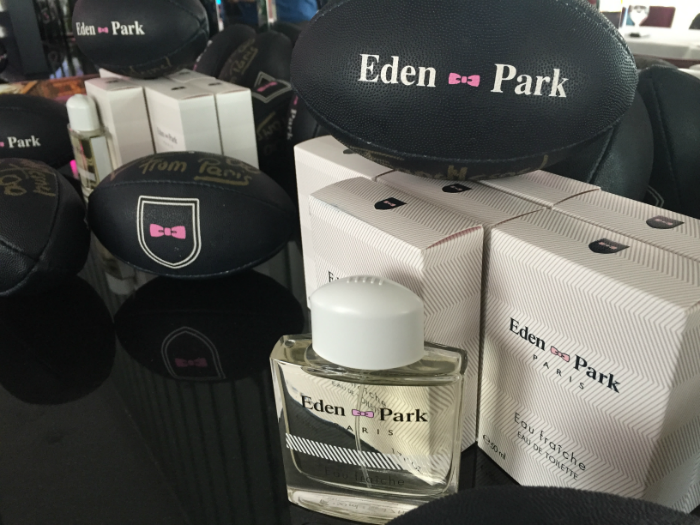 Fragrances and rugby balls symbolising the brand.