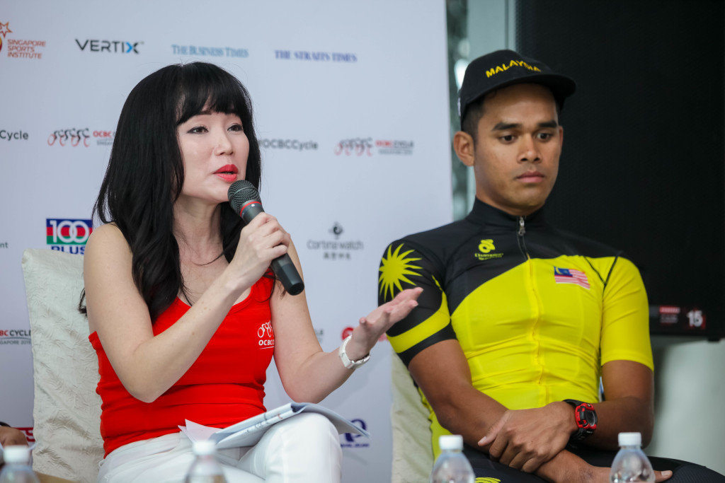 Ms Koh Ching Ching, Head of Group Corporate Communications OCBC Bank (left) speaks to Mohd Hariff Bin Salleh, Team Malaysia cyclist (right). (Photo Credit: OCBC Cycle 2015)