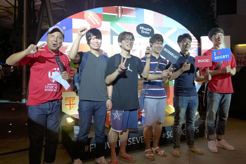 Rugby fans soak up path atmosphere.