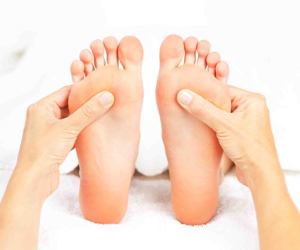 Foot Reflexology is all about stimulating pressure points on the foot. [Photo from www.aurora-massage.com]
