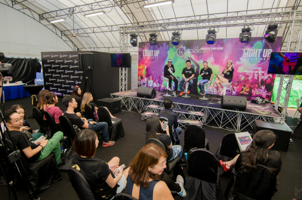 Members of the media gather at the press conference at Novena.