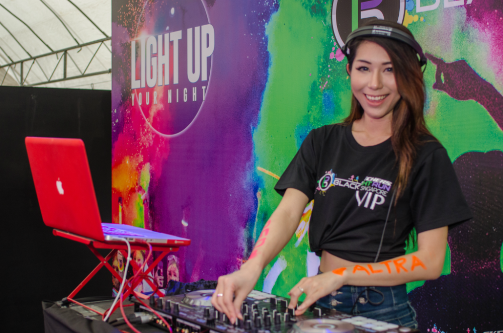 DJ Red plays for the audience at the launch event.