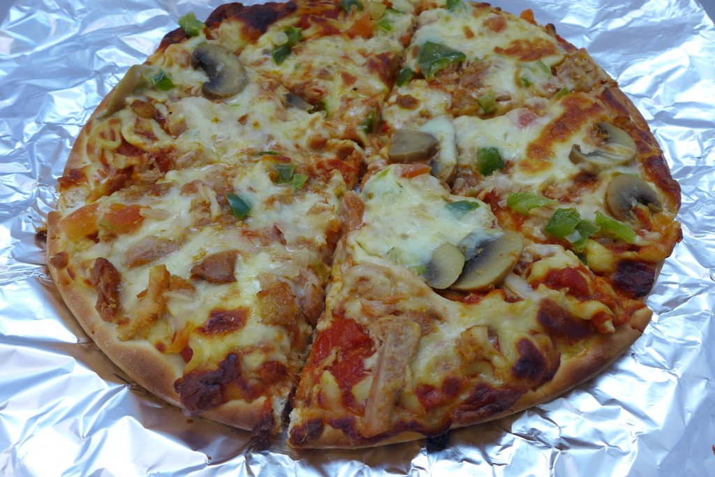 Tom Yum Chicken Pizza.