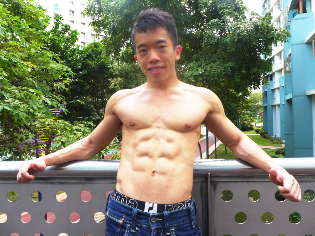 Ivan Low shows off his six-pack body.