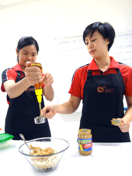 Demonstration on how to make the Nut & Muesli Balls.