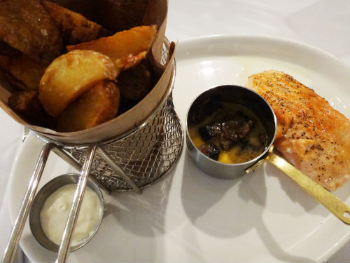 Salmon WIth Chips and Mushroom Sauce.